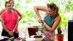 Visitors making chocolate at Vista Los Sueños, Herradura