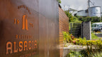 Entrance and visitor center at Hacienda Alsacia coffee farm, Costa Rica