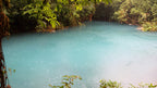 Sky-blue water of Río Celeste in Tenorio Volcano National Park, Costa Rica
