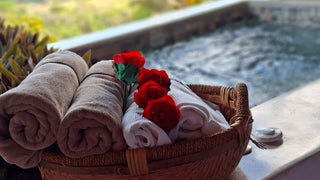 Towels and flowers prepared in a spa treatment pavilion at Xandari