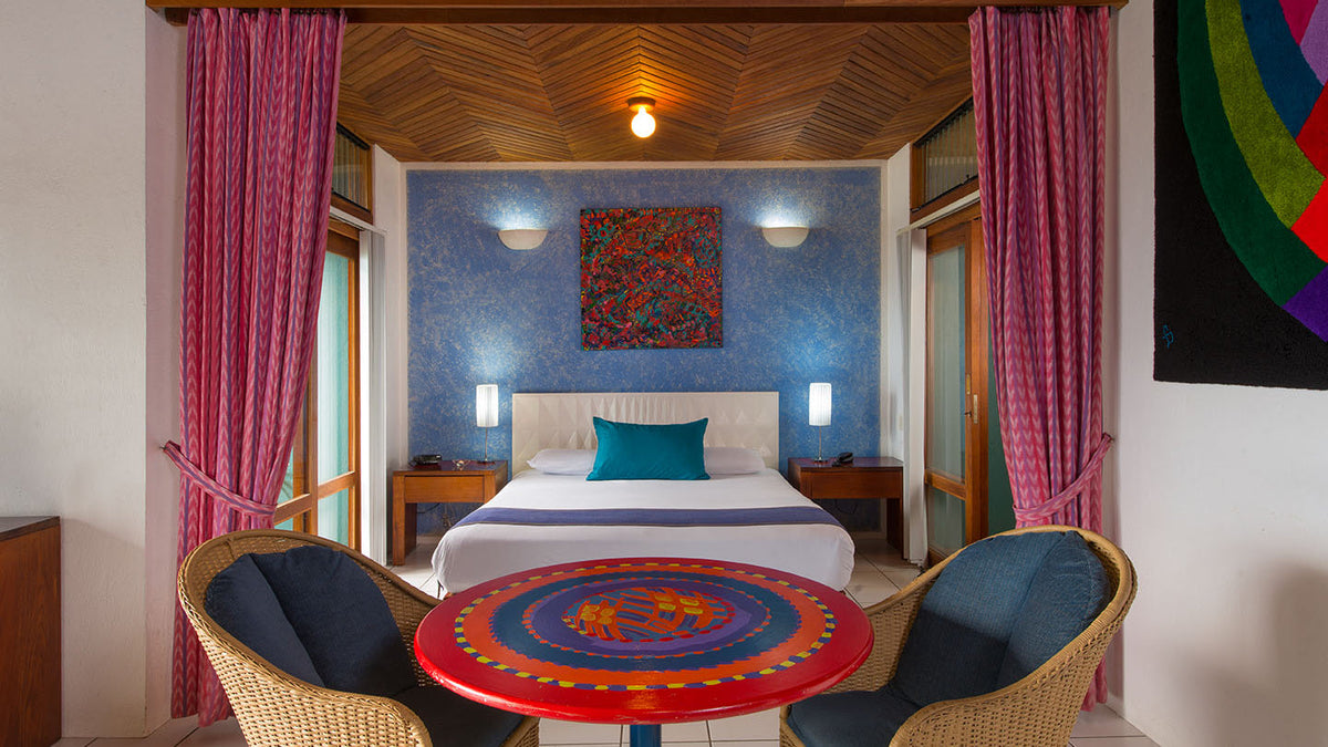 Bedroom and sitting area of a Prima Plus Villa at Xandari