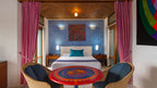Bedroom and sitting area of a Prima Plus Villa at Xandari