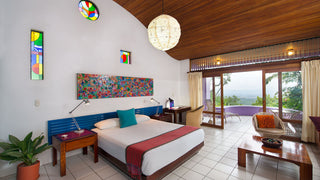 Bedroom and terrace in a Prima Villa at Xandari Resort