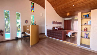 Bedroom and sitting area of an Ultra Villa at Xandari Resort